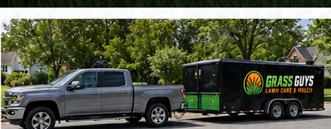 Grass Guys lawn care truck and trailer